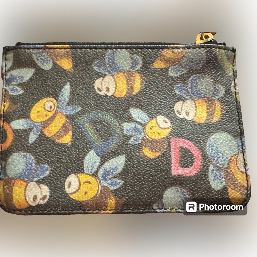 Dooney and Bourke Bee wristlet/rainbow zipper